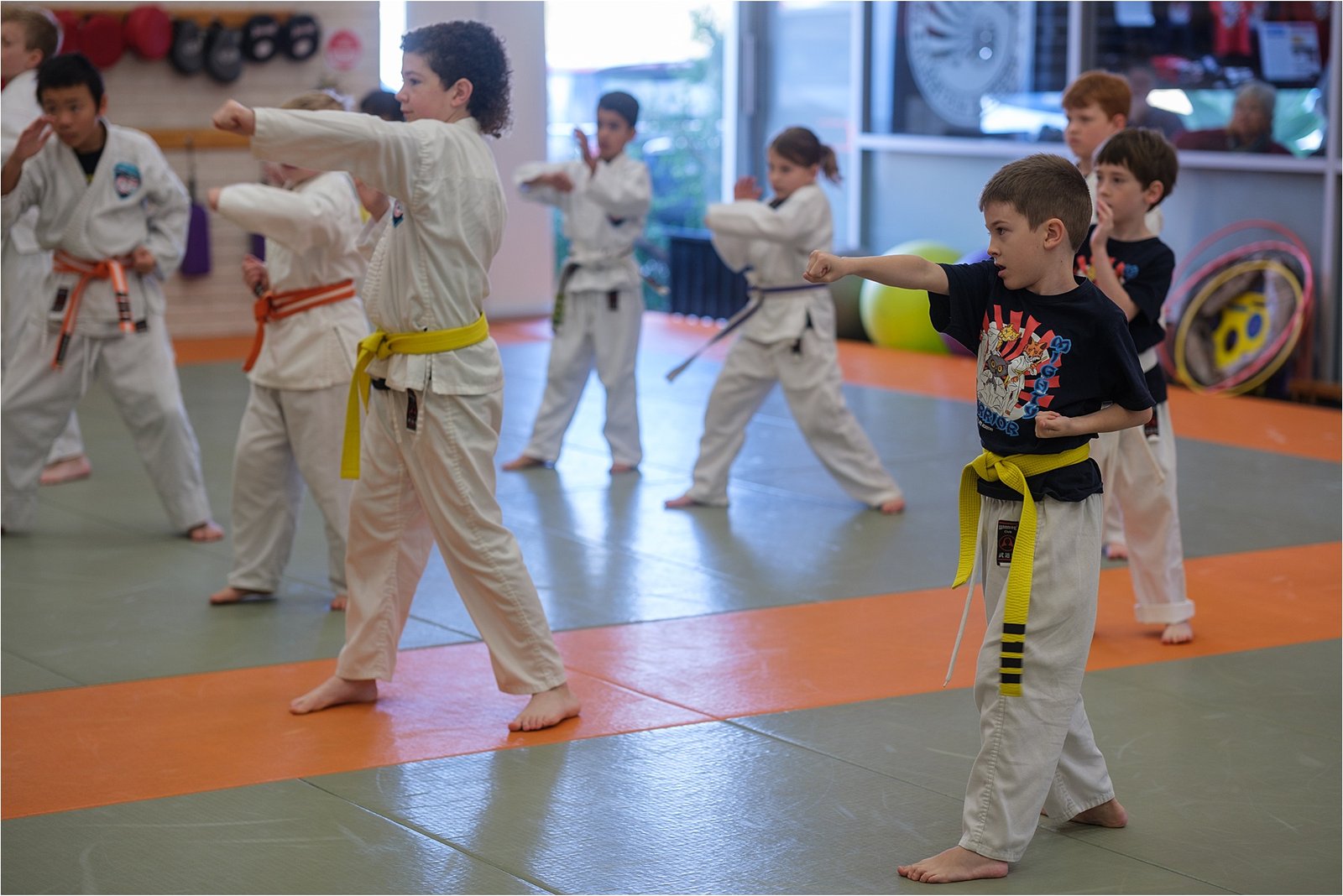 Children practising martial arts together
